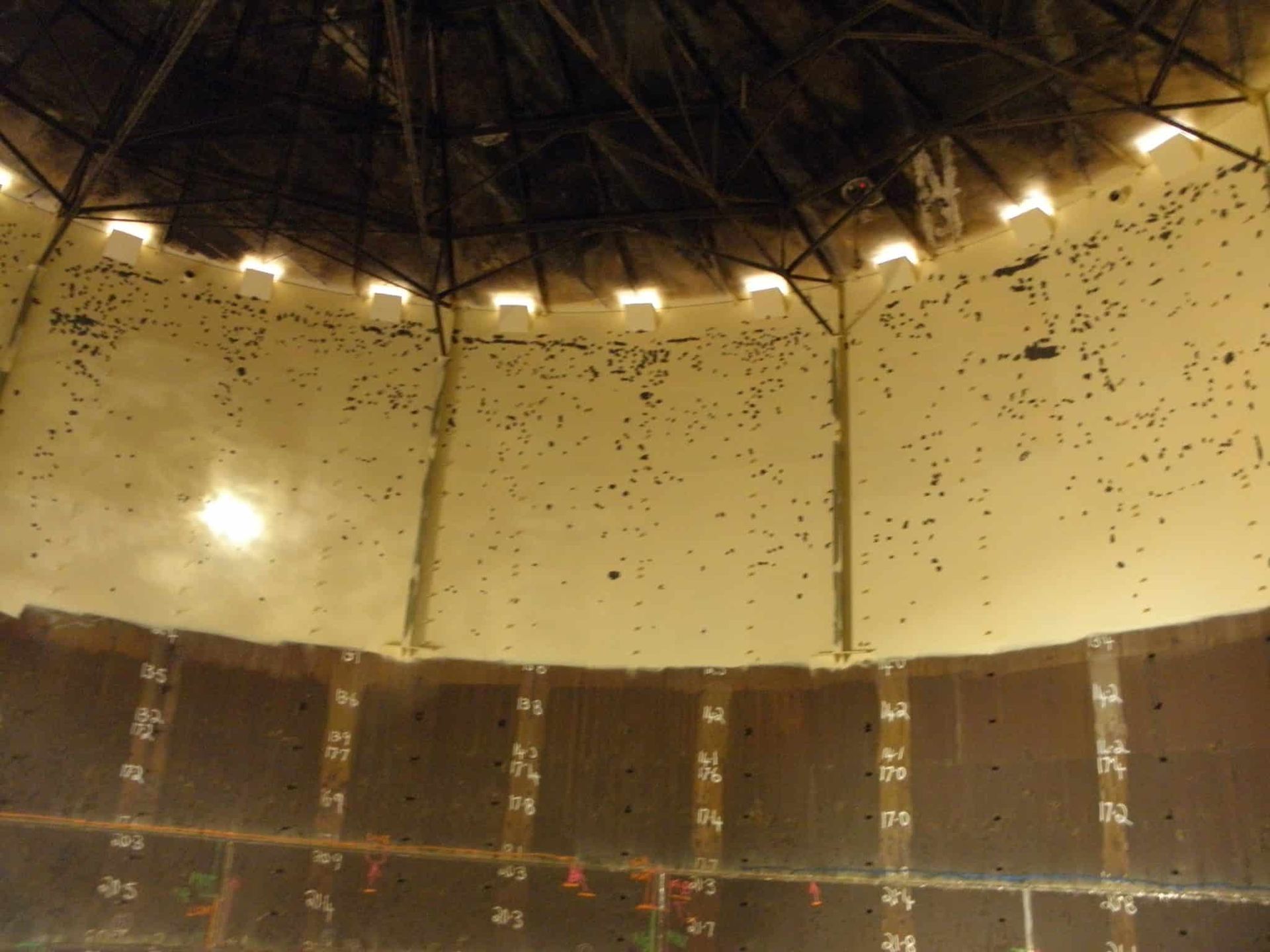 The Inside of a Building With a Ceiling That Has a Few Lights on It — Waters Abrasive Blasting Services In Shaw, QLD