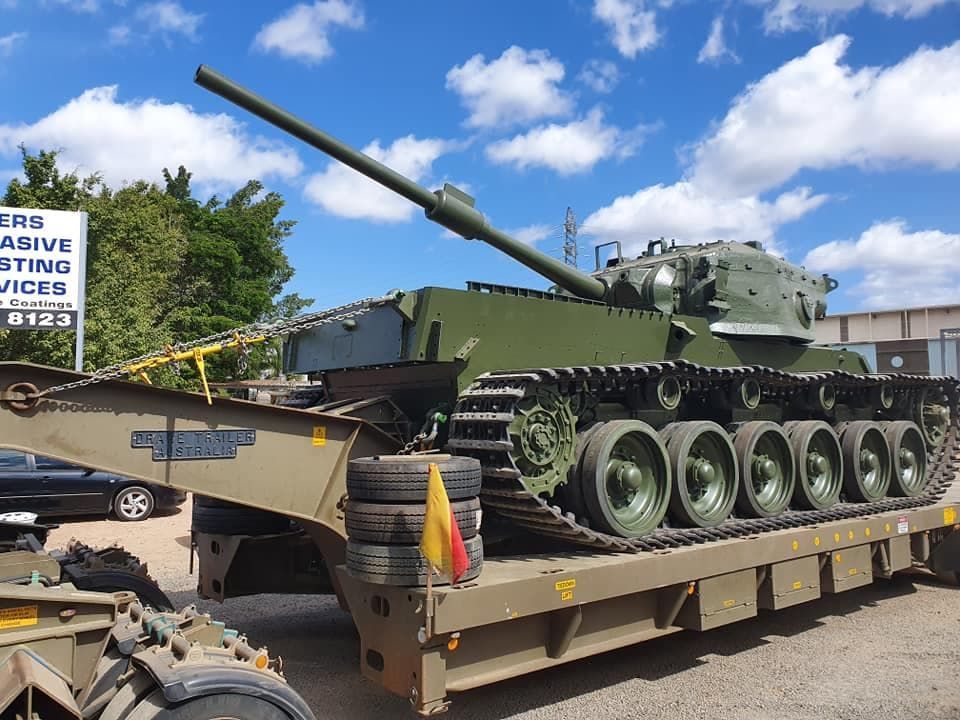 A Green Tank is Sitting on Top of a Trailer — Waters Abrasive Blasting Services In Tully, QLD