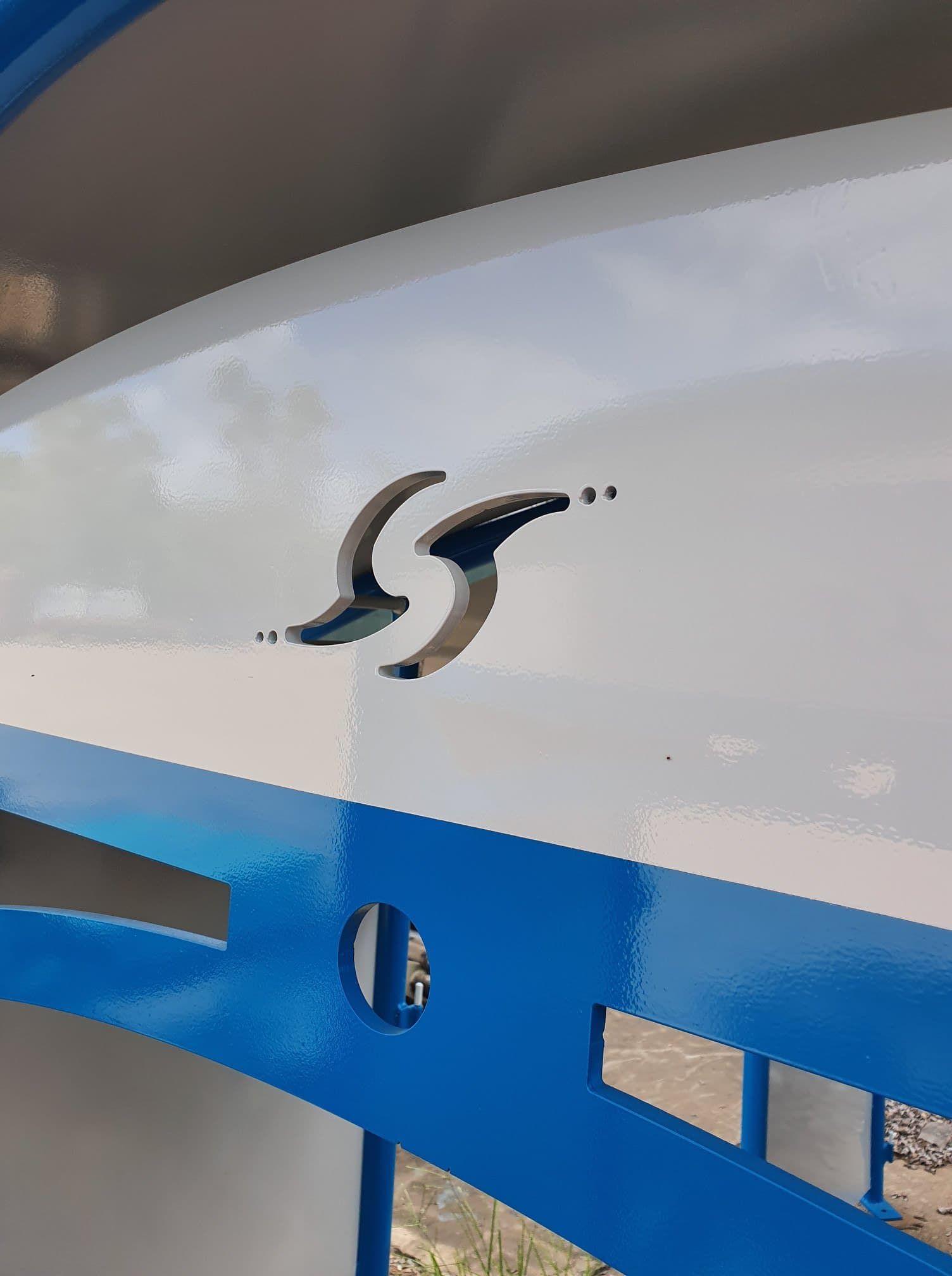 A Blue and White Sign With the Letter S on It — Waters Abrasive Blasting Services In Tully, QLD