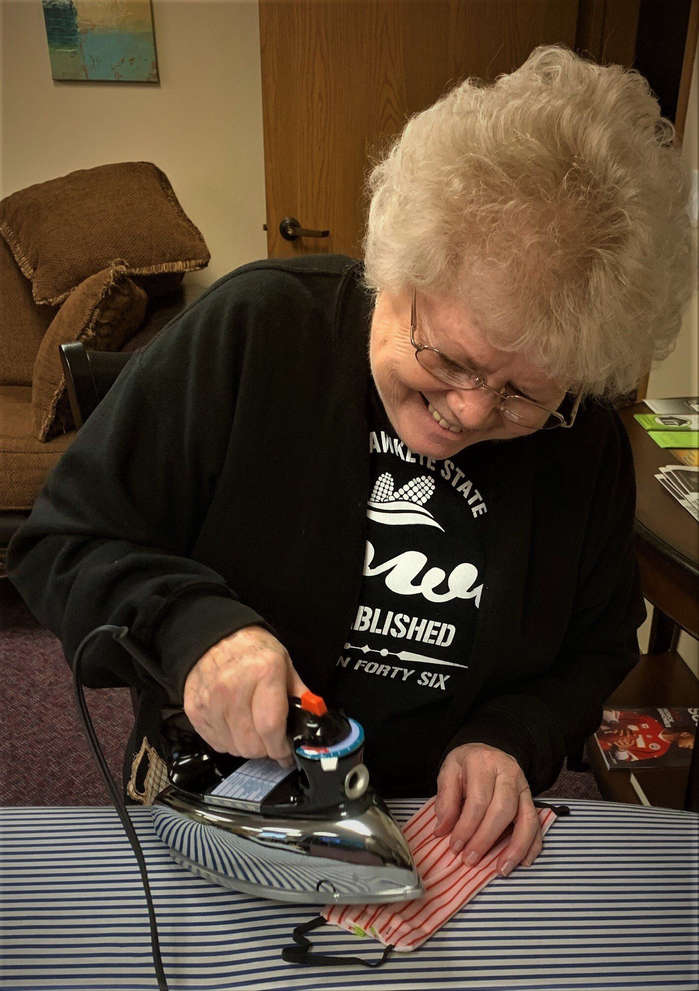 Elderly Woman Ironing Fabric Mask