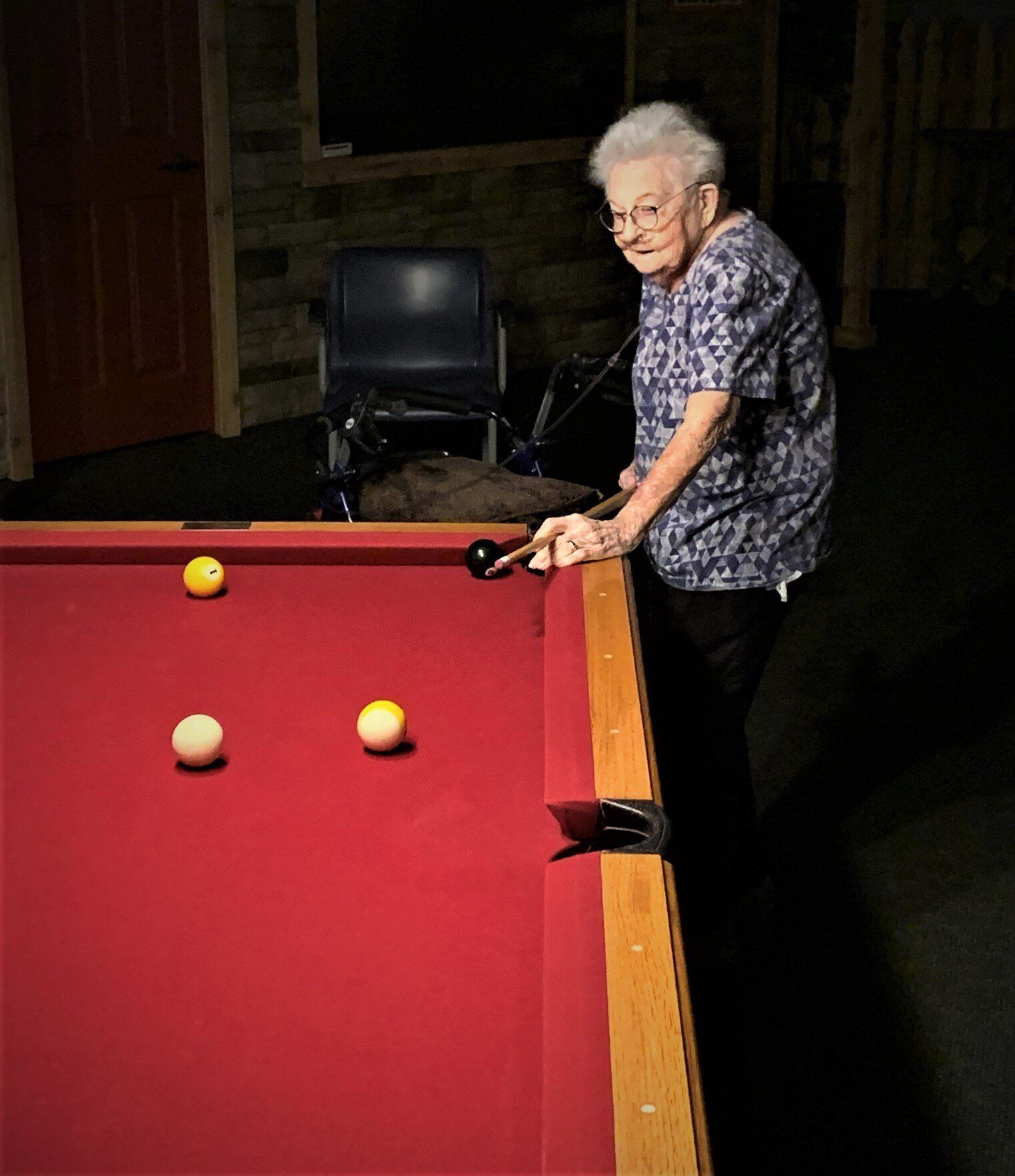 Senior Female on Oxygen Playing Pool