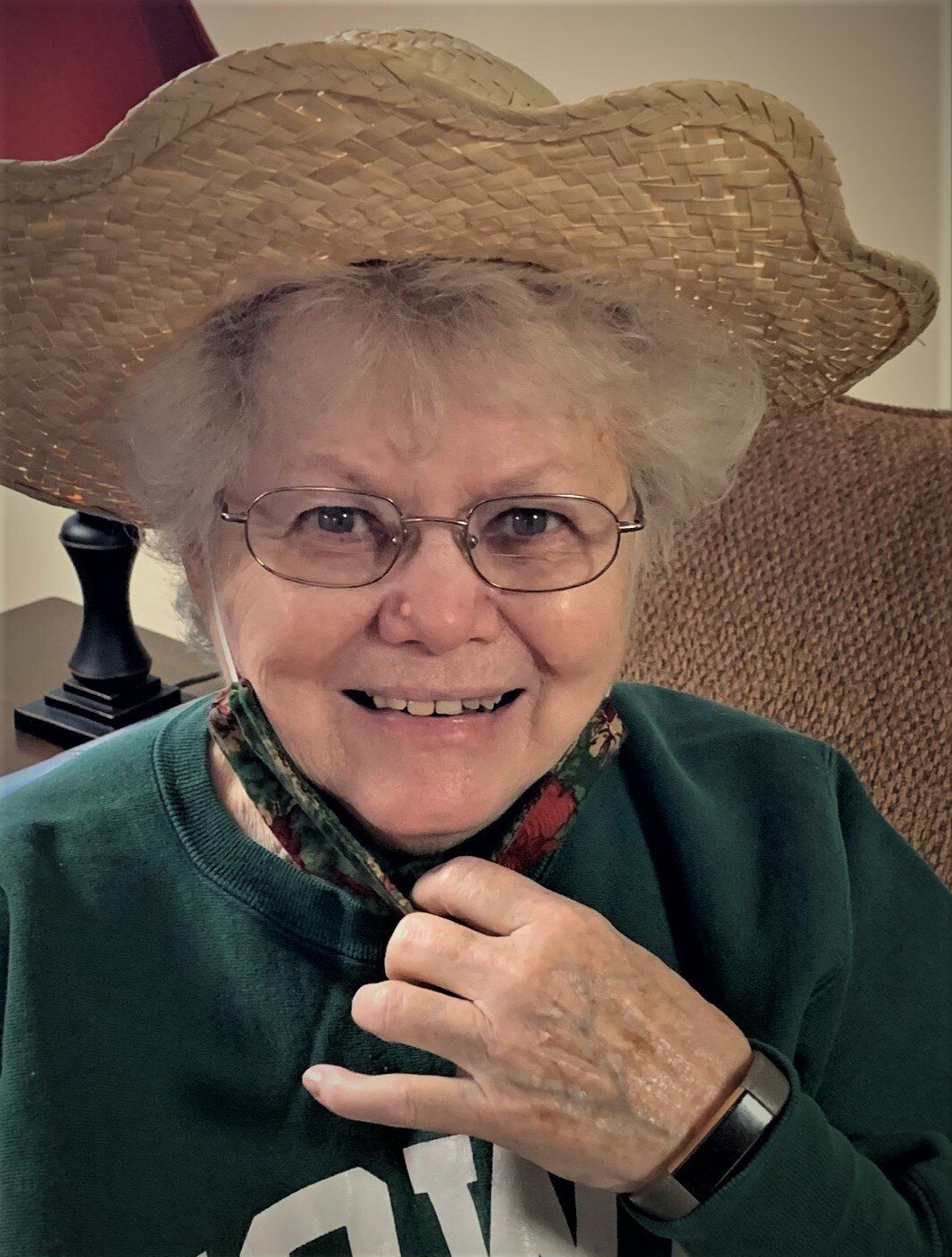 Senior Woman Wearing Scalloped Wicker Hat