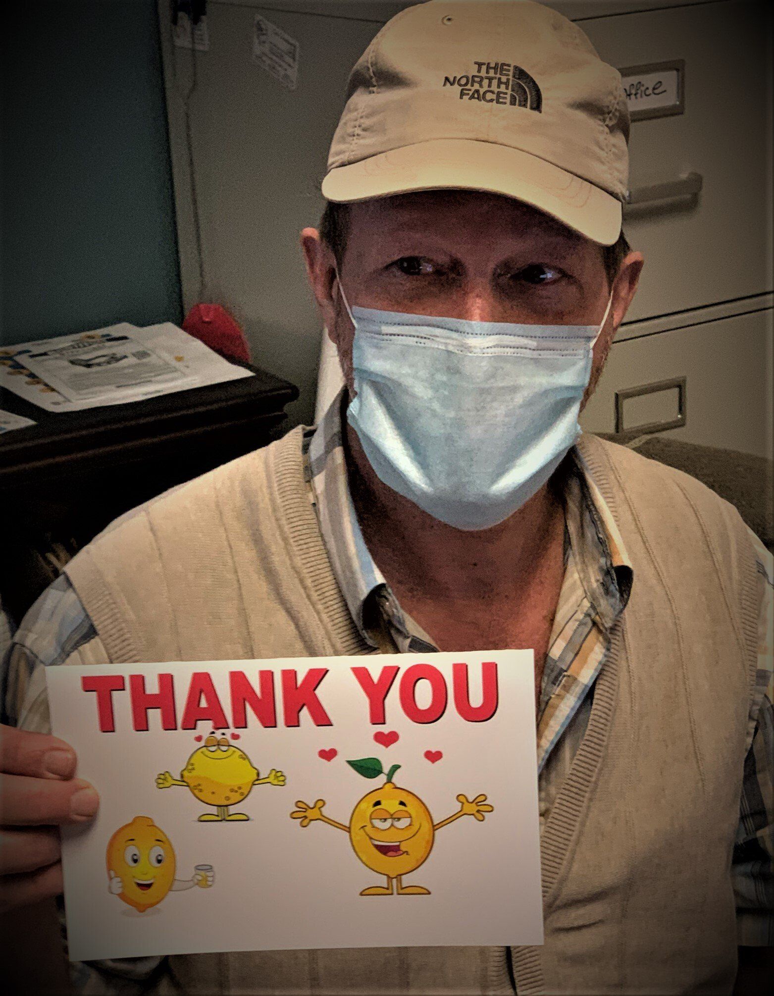 Man Holding Thank You Sign