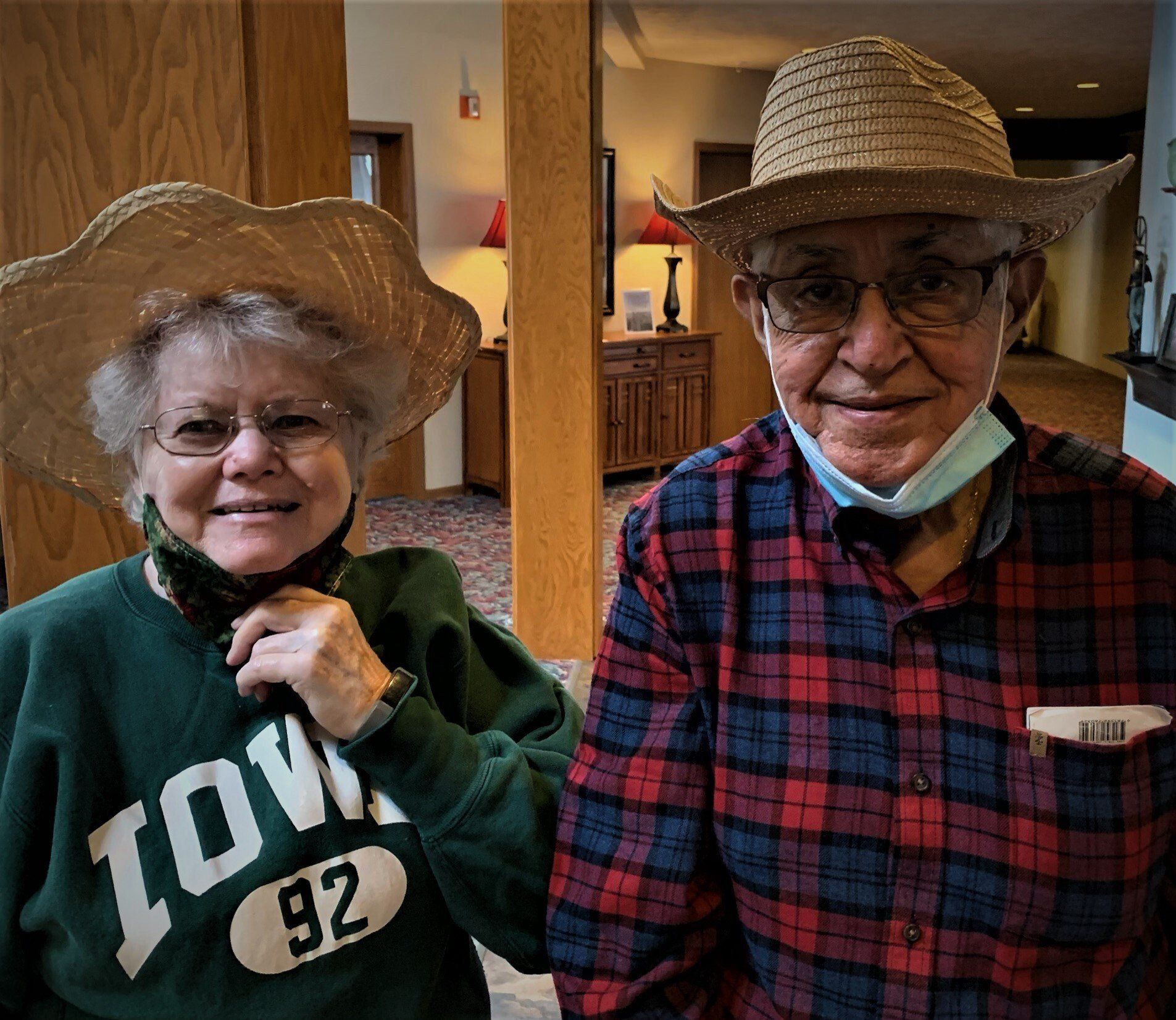 Senior Couple Wearing Wicker Hats