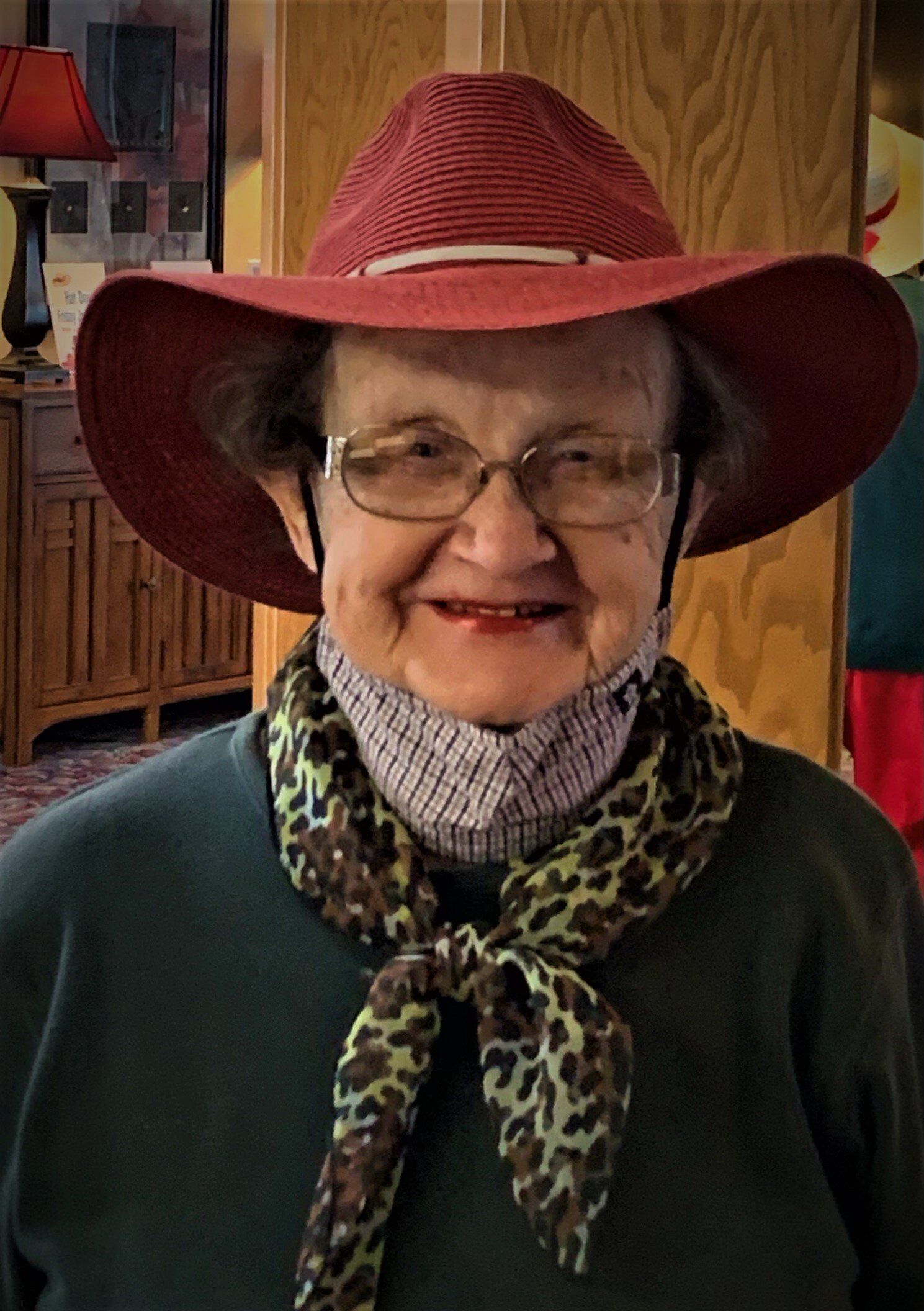 Senior Woman Wearing Large Brimmed Red Hat