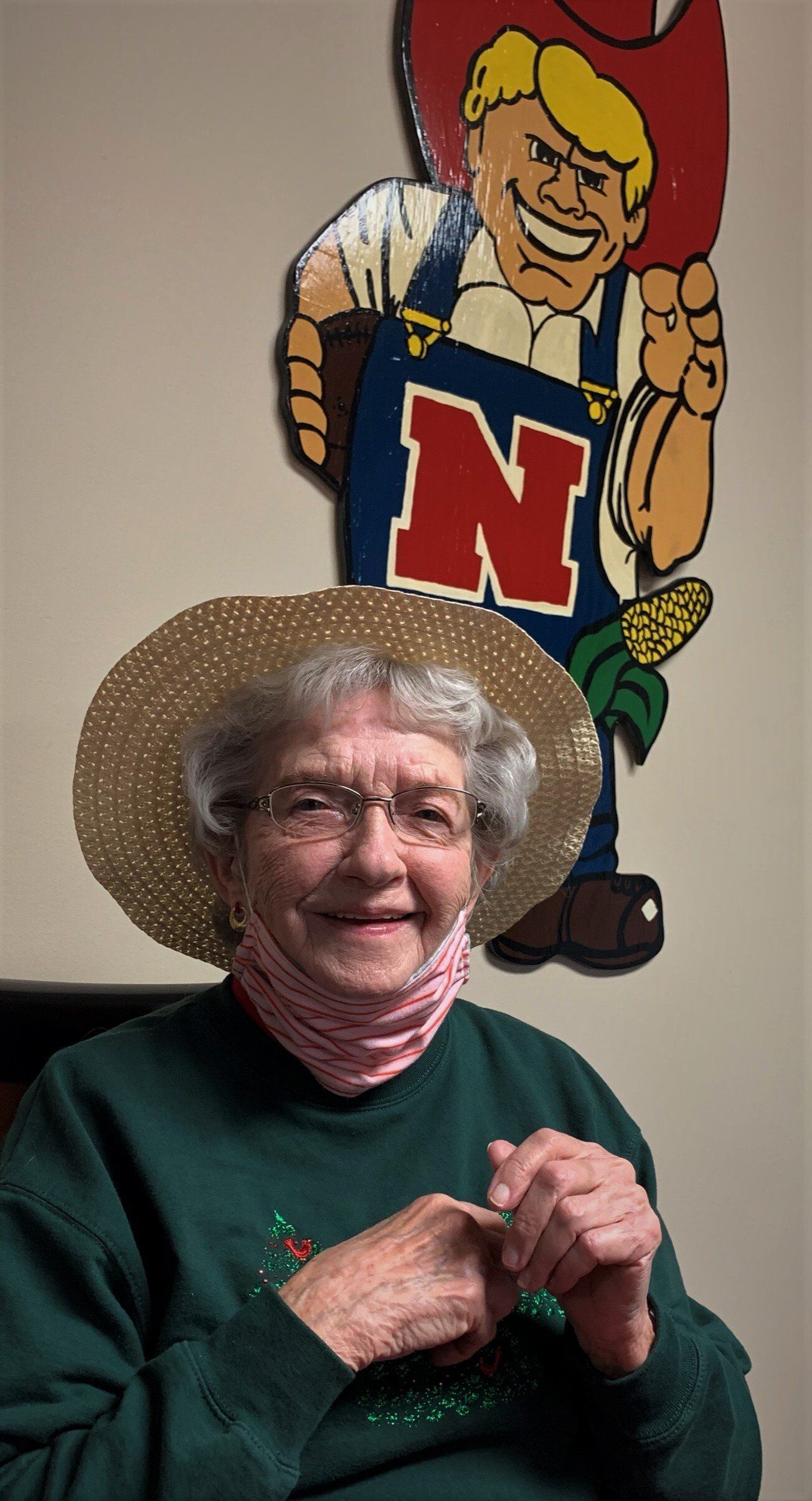 Happy Senior Woman with Cute Wicker Hat