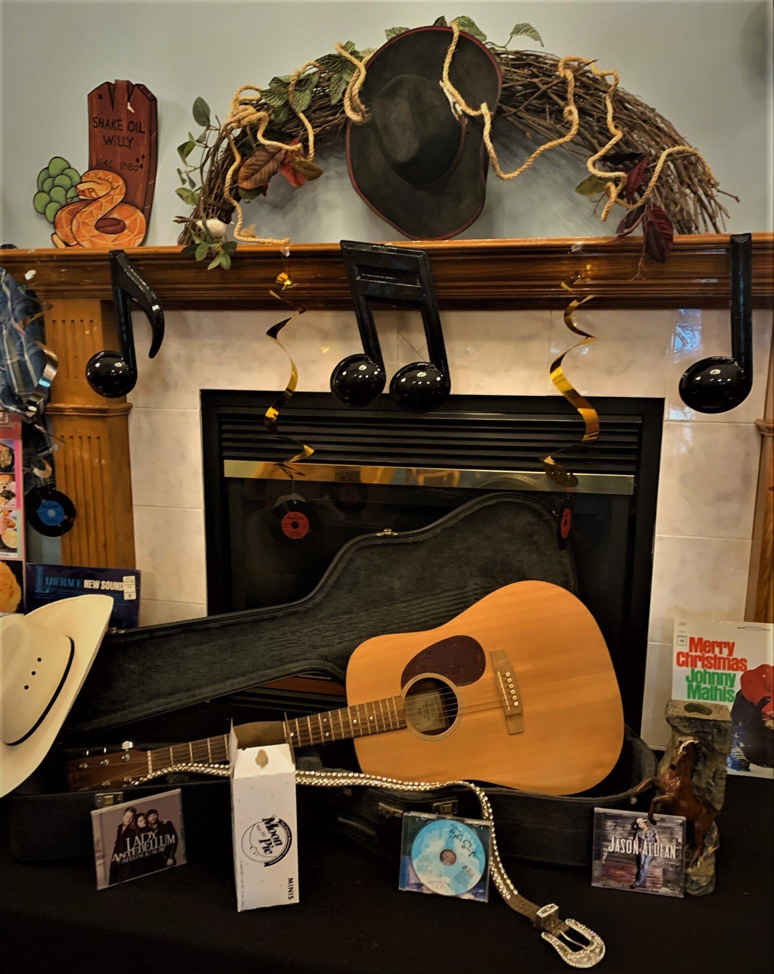 Guitar, CDs, & Music Notes for Western Night at Senior Housing Facility