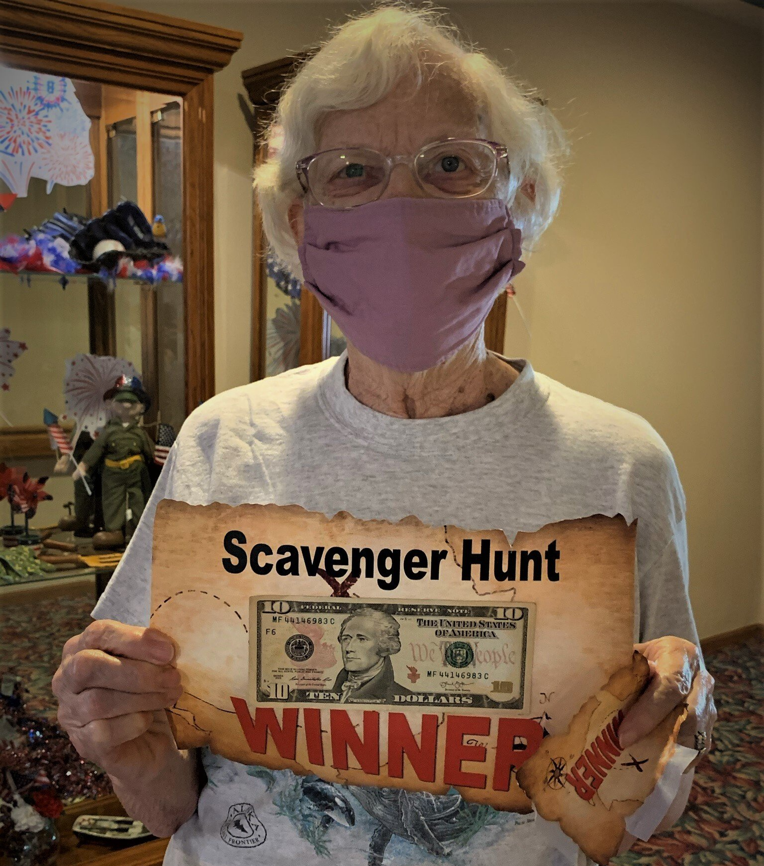 Proud Elderly Women as Scavenger Hunt Winner