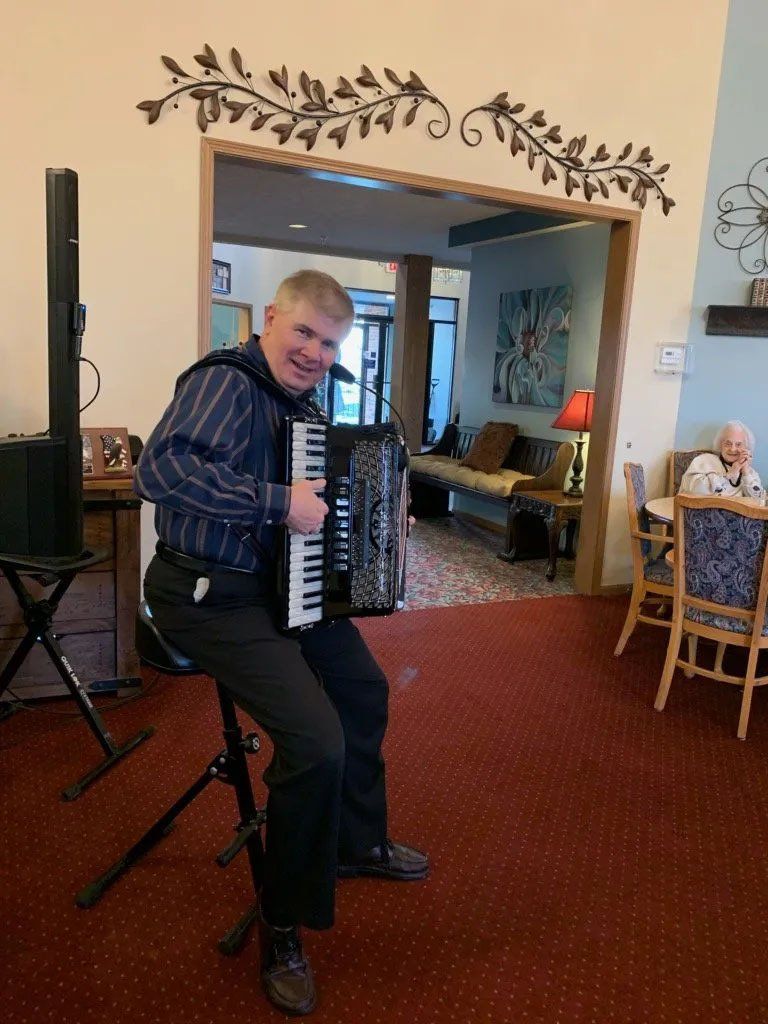 Man Playing Accordion for Seniors