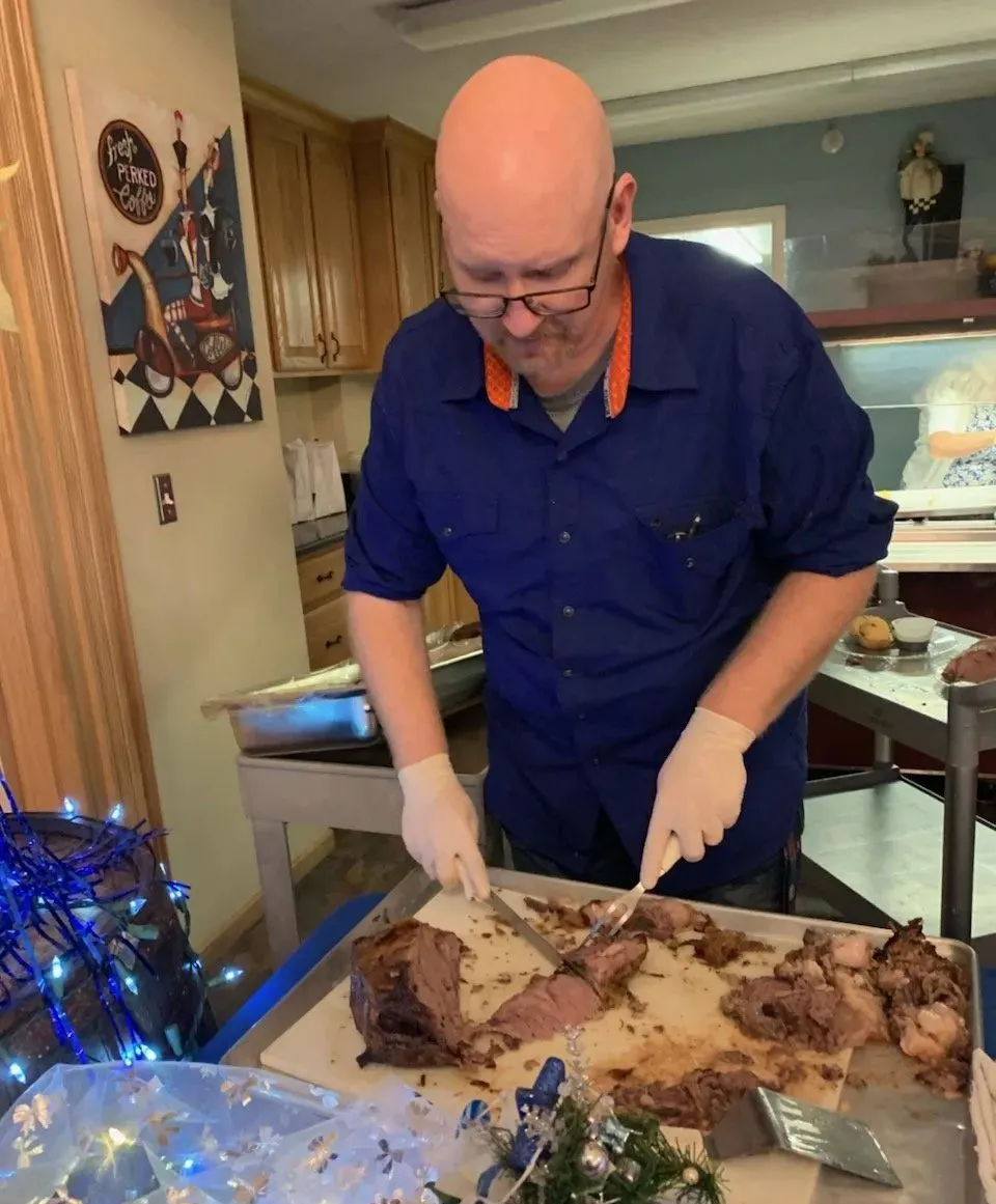 Chef Slicing Meat for Christmas Dinner
