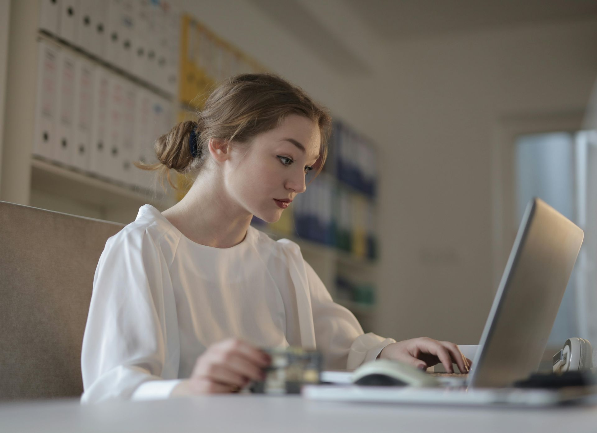 A female accountant working in her laptop.
