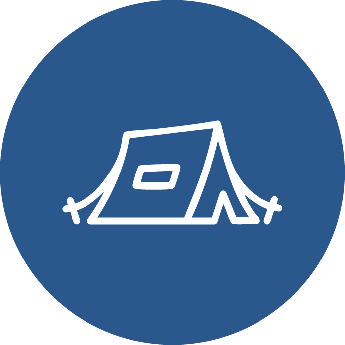 White tent icon within a blue circle.