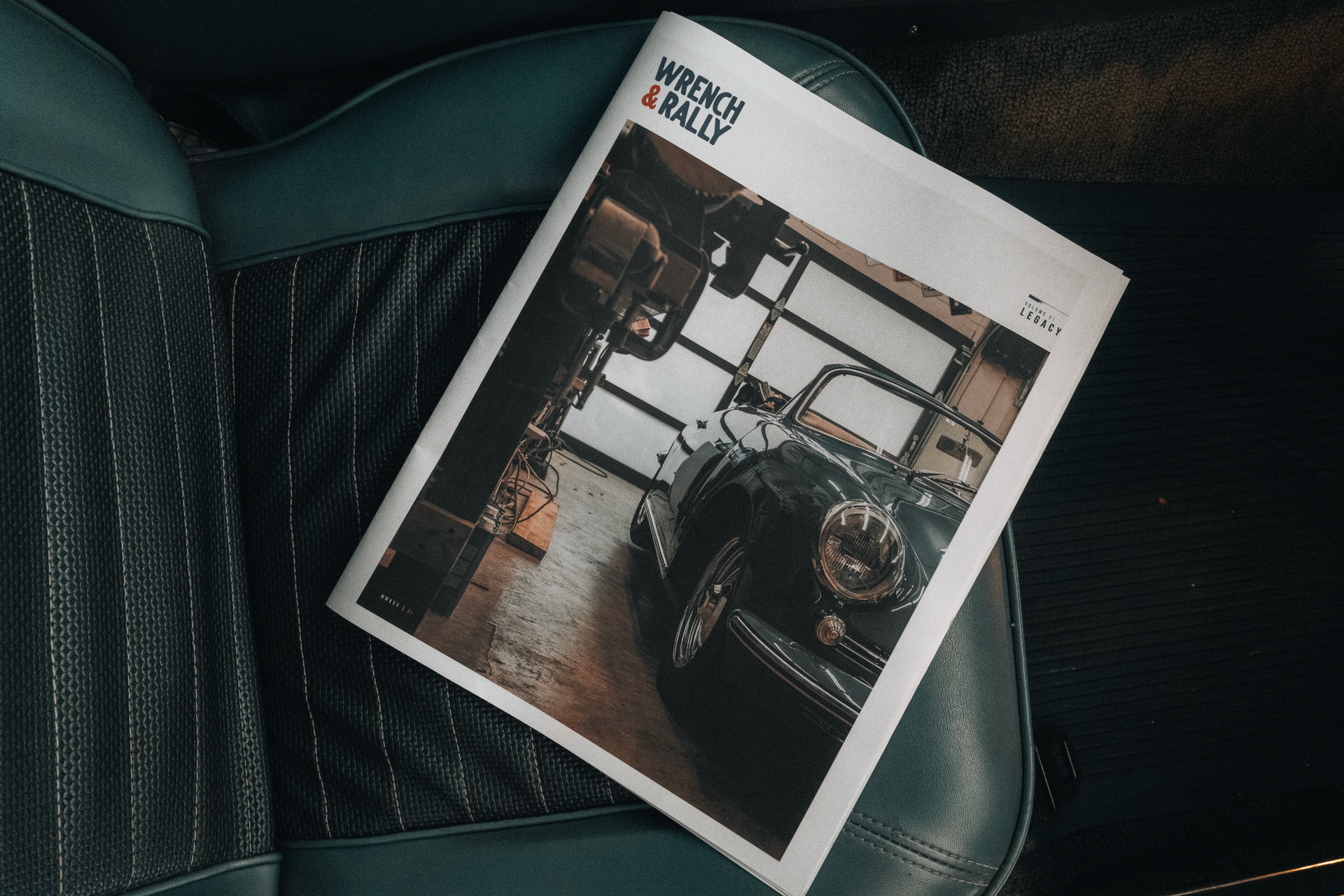 A magazine with a picture of a car on it