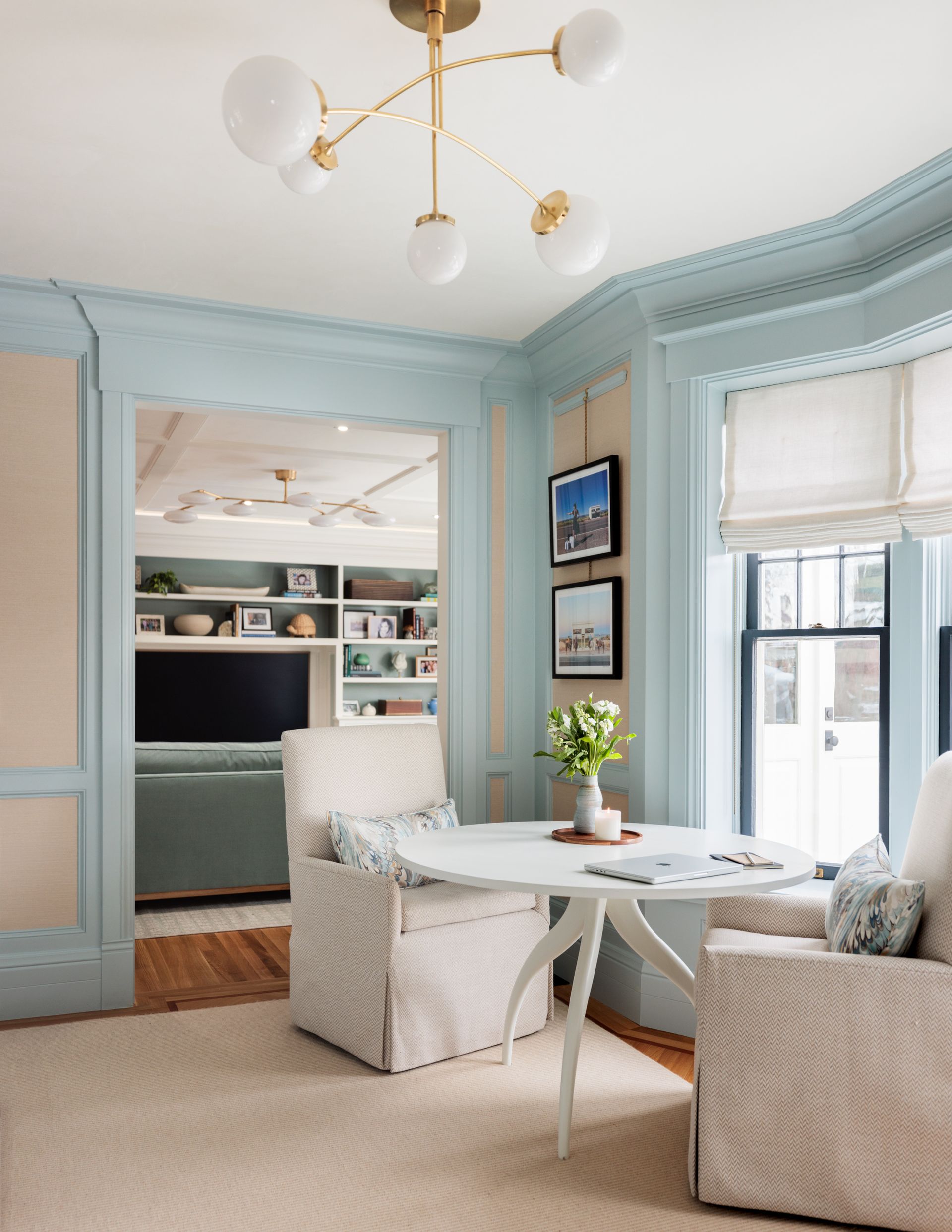 dining nook with white roman shades