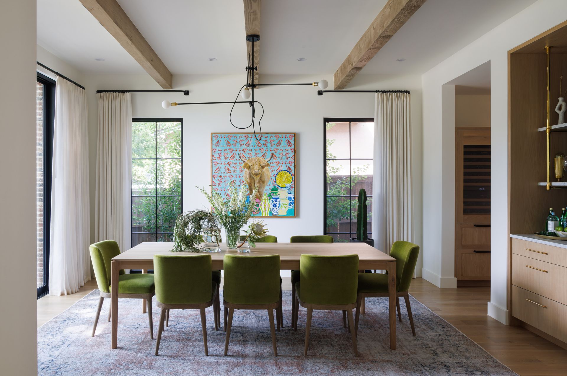 Luxurious custom drapery in an elegant living room, showcasing the intricate craftsmanship