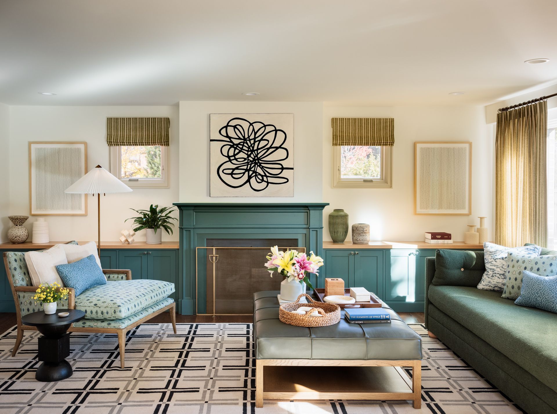 A living room with a green couch and a blue fireplace