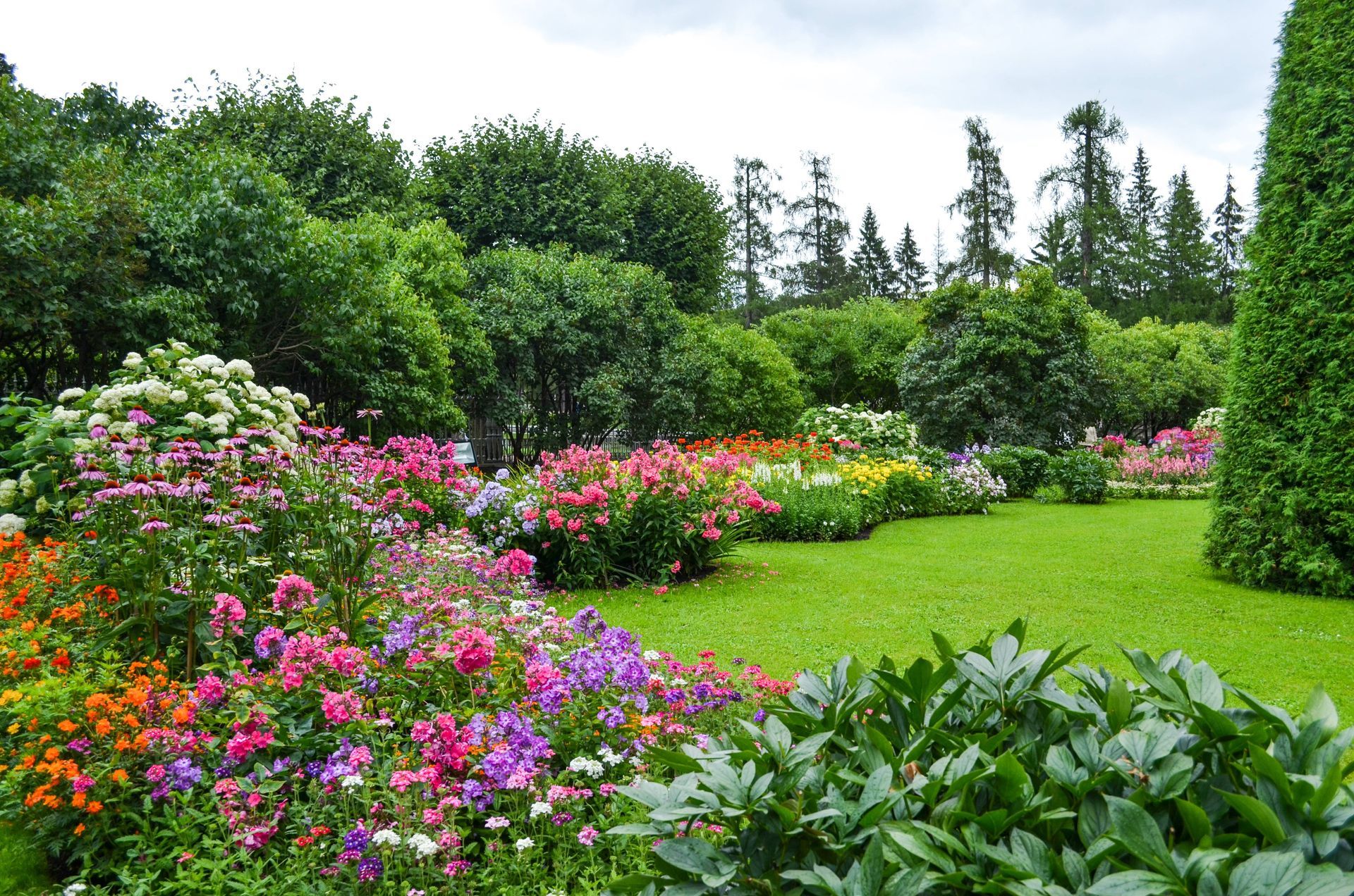 A stunning garden with various flowers, shrubs, and trees near Campbellsville, KY
