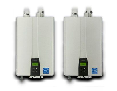 Two white water heaters are sitting next to each other on a white background.