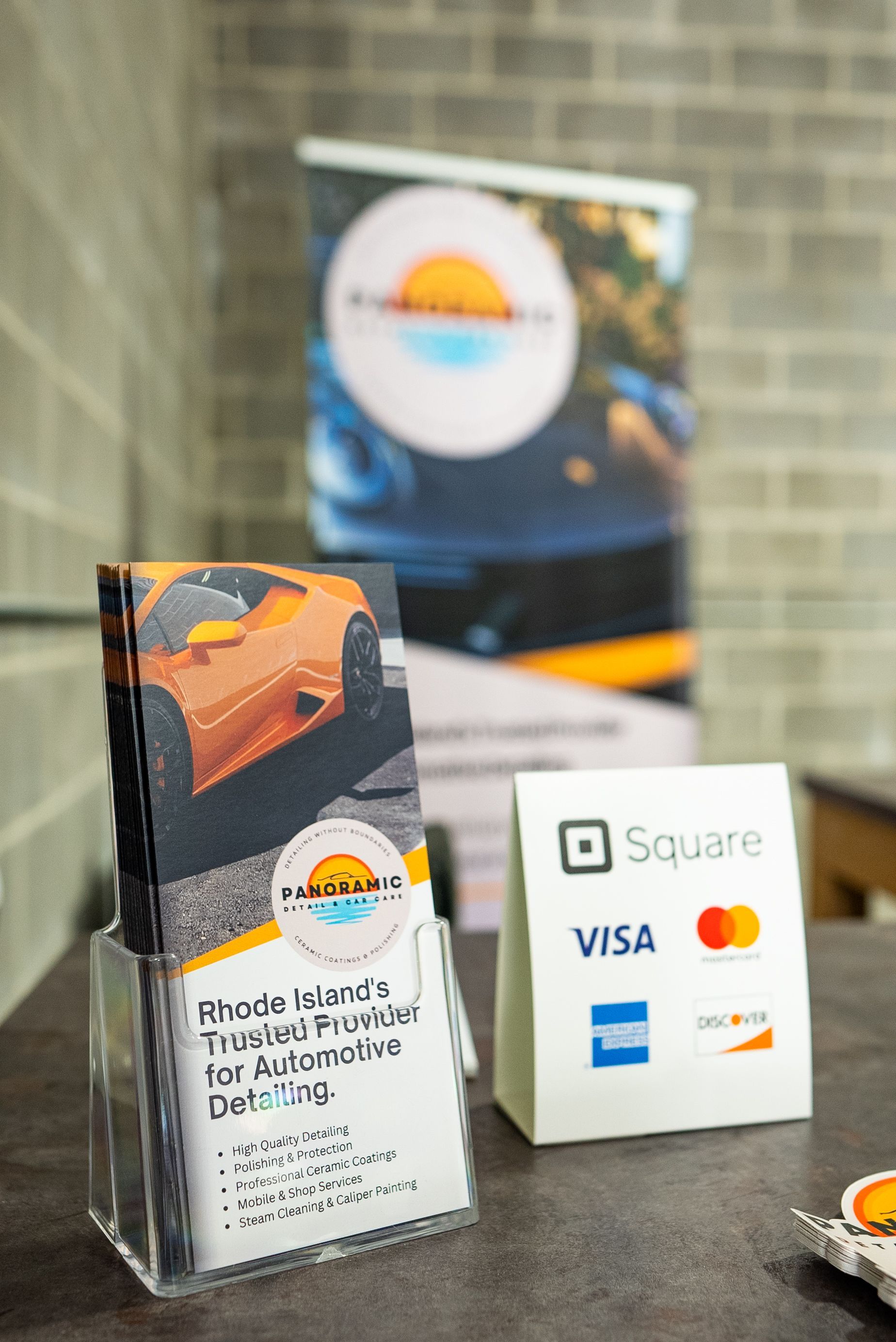 A bunch of cars are parked in a garage.