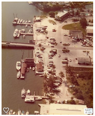 An aerial view of a marina with boats in it