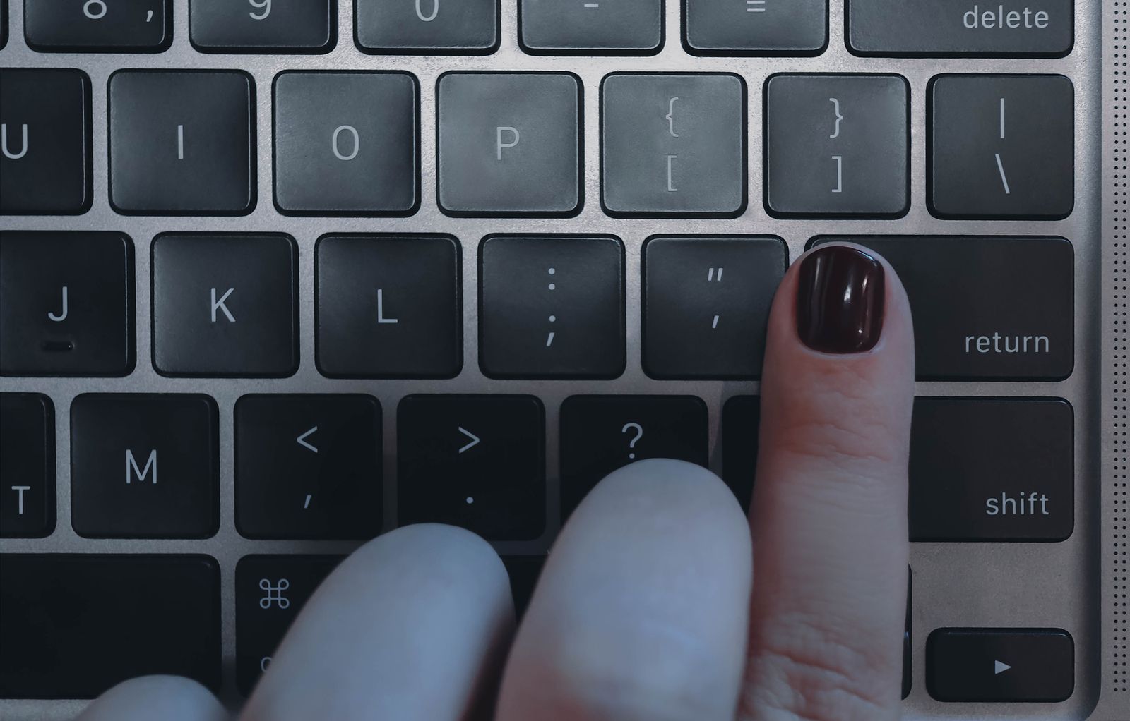 Fingers Typing on a Keyboard