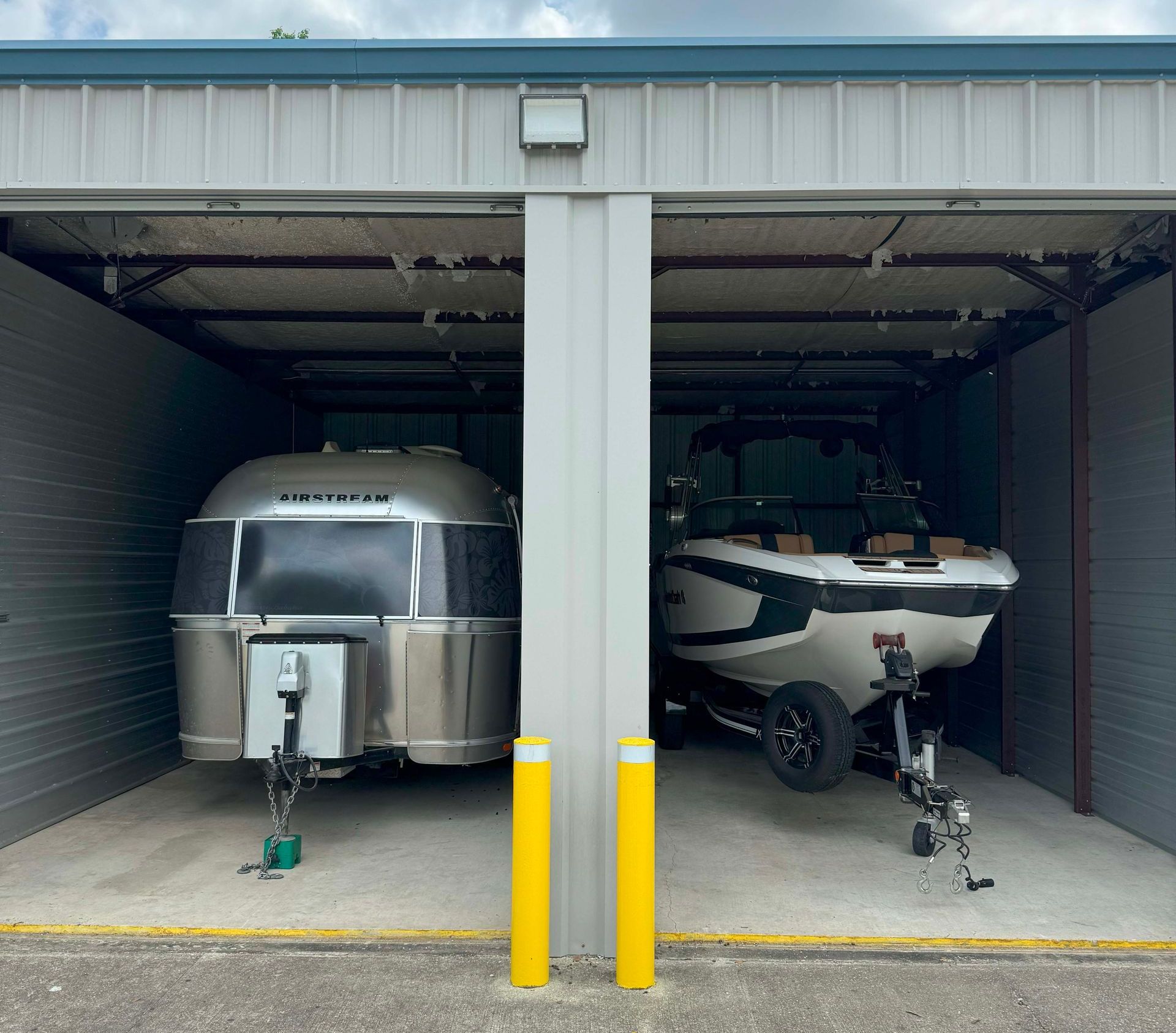 Boat & RV parking in enclosed units to keep your items secure with 24/7 access and great customer service in Zachary, LA