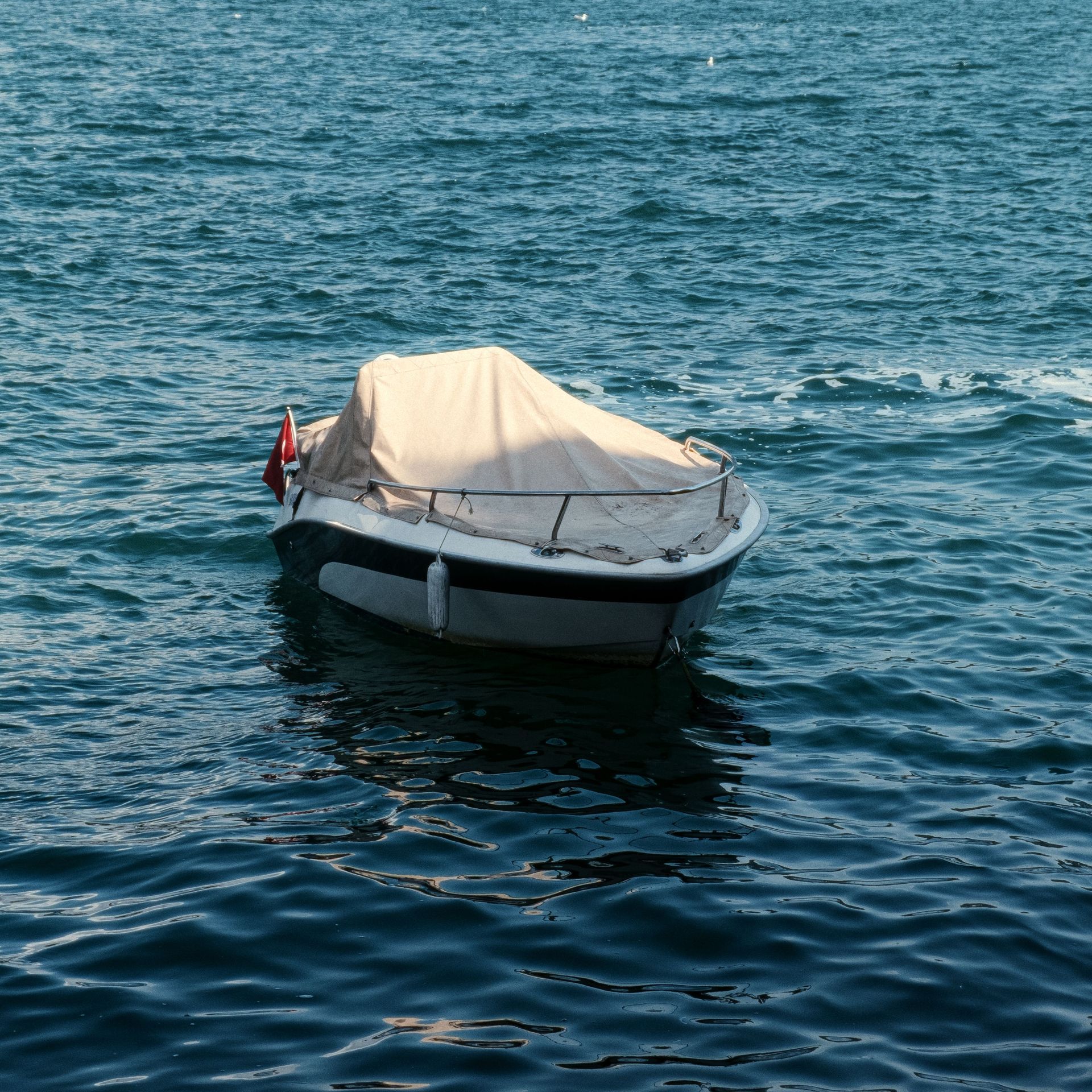 A boat covered and ready to be stored at Advanced Mini Storage in Zachary, LA
