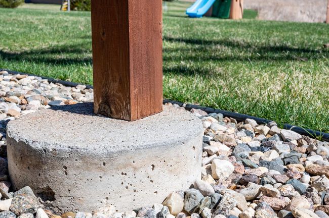 Three steel helical piers for foundation support.
