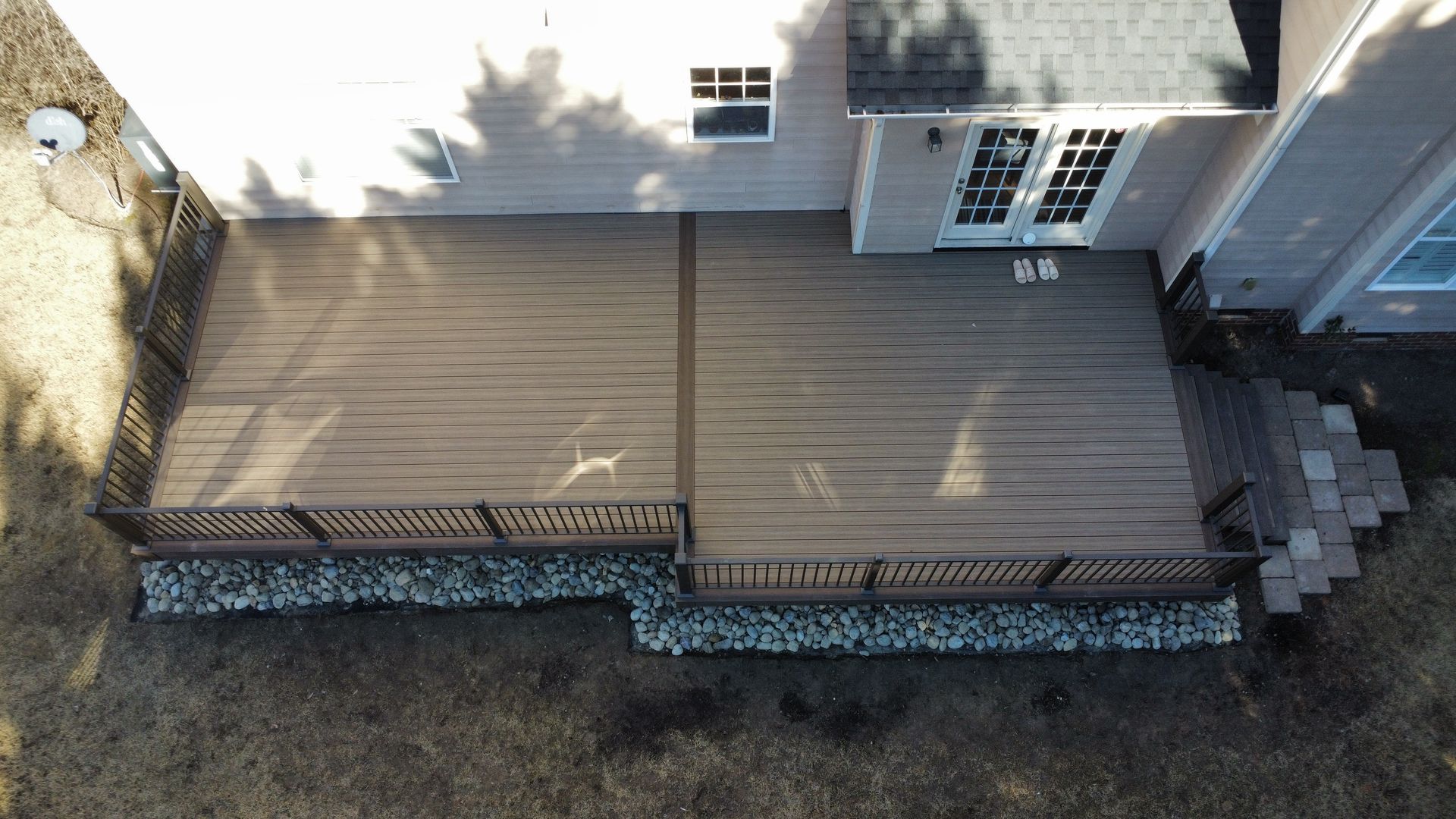 Overhead view of a composite deck with two levels, attached to a ligh