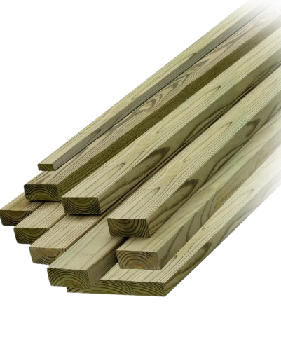 Pile of treated lumber, varying lengths, green-gray color, stacked at an angle, outdoors.