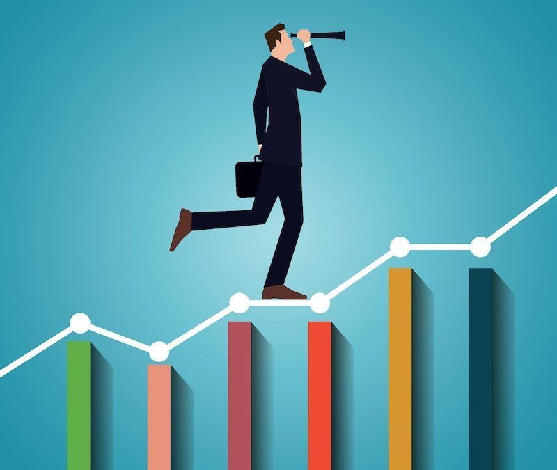 Businessman with briefcase using telescope, running on rising graph bars, blue background.