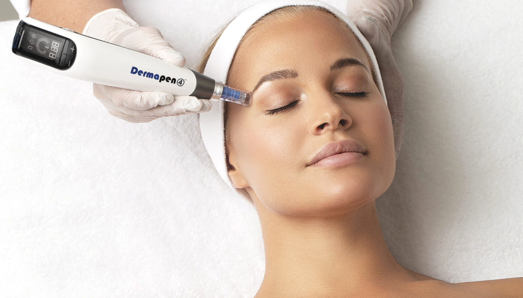 A woman is getting a facial treatment at a beauty salon.