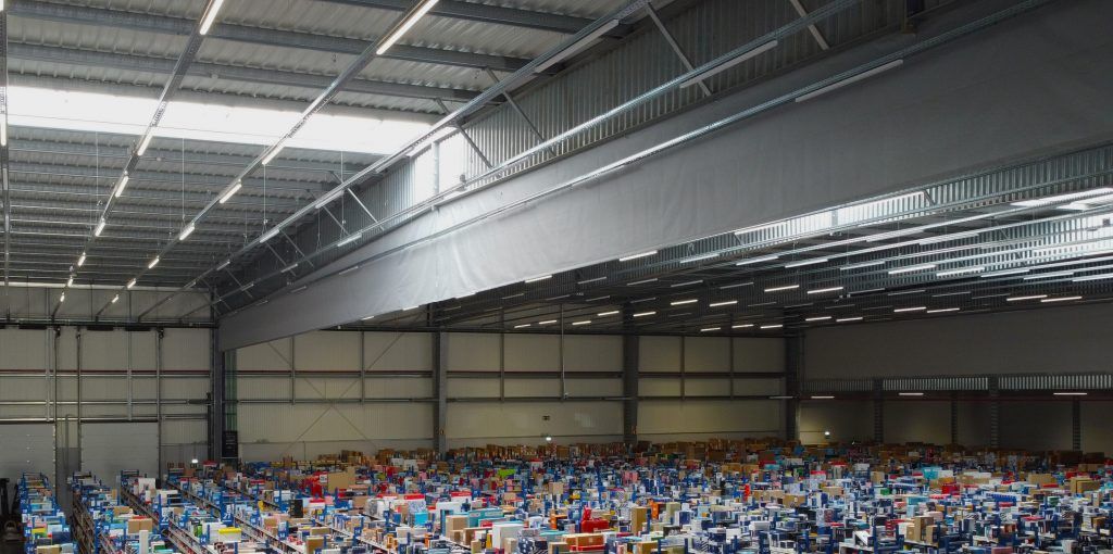 A large warehouse filled with lots of boxes.