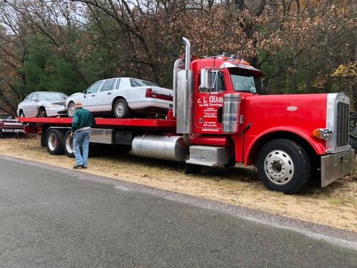 Two Cars On A Tow Truck — Camp Douglas, WI — C. L. Chase 24 Hour Towing & Recovery
