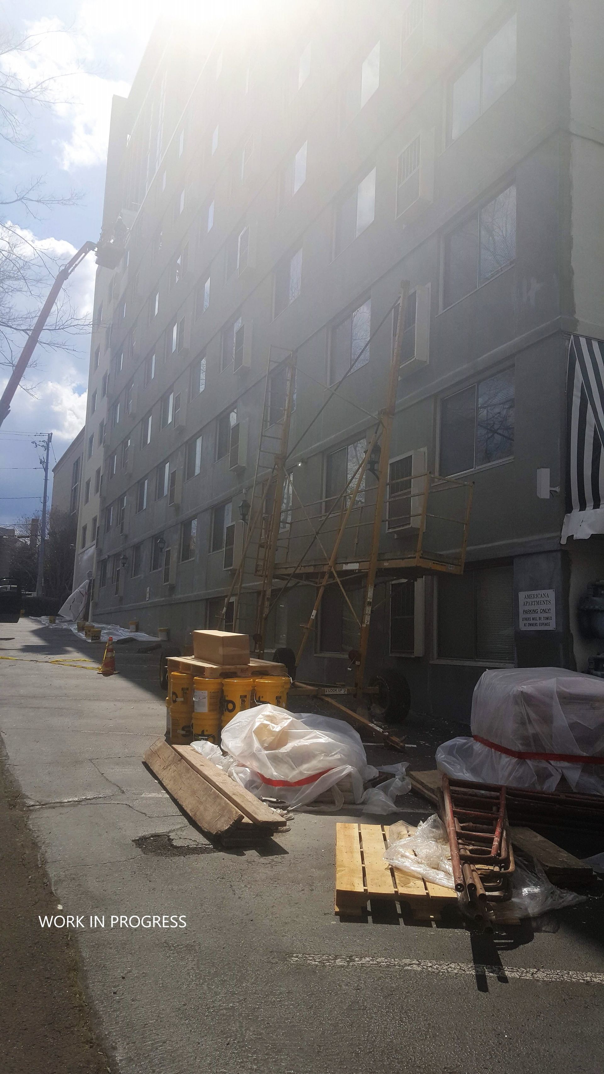 A large building with a lot of windows is being built.