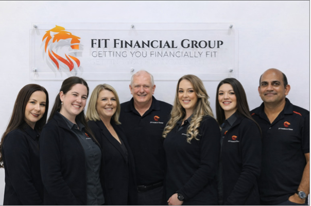 Four Women in Black Shirts in Front of a Sign — Fit Financial Group in Leumeah, NSW