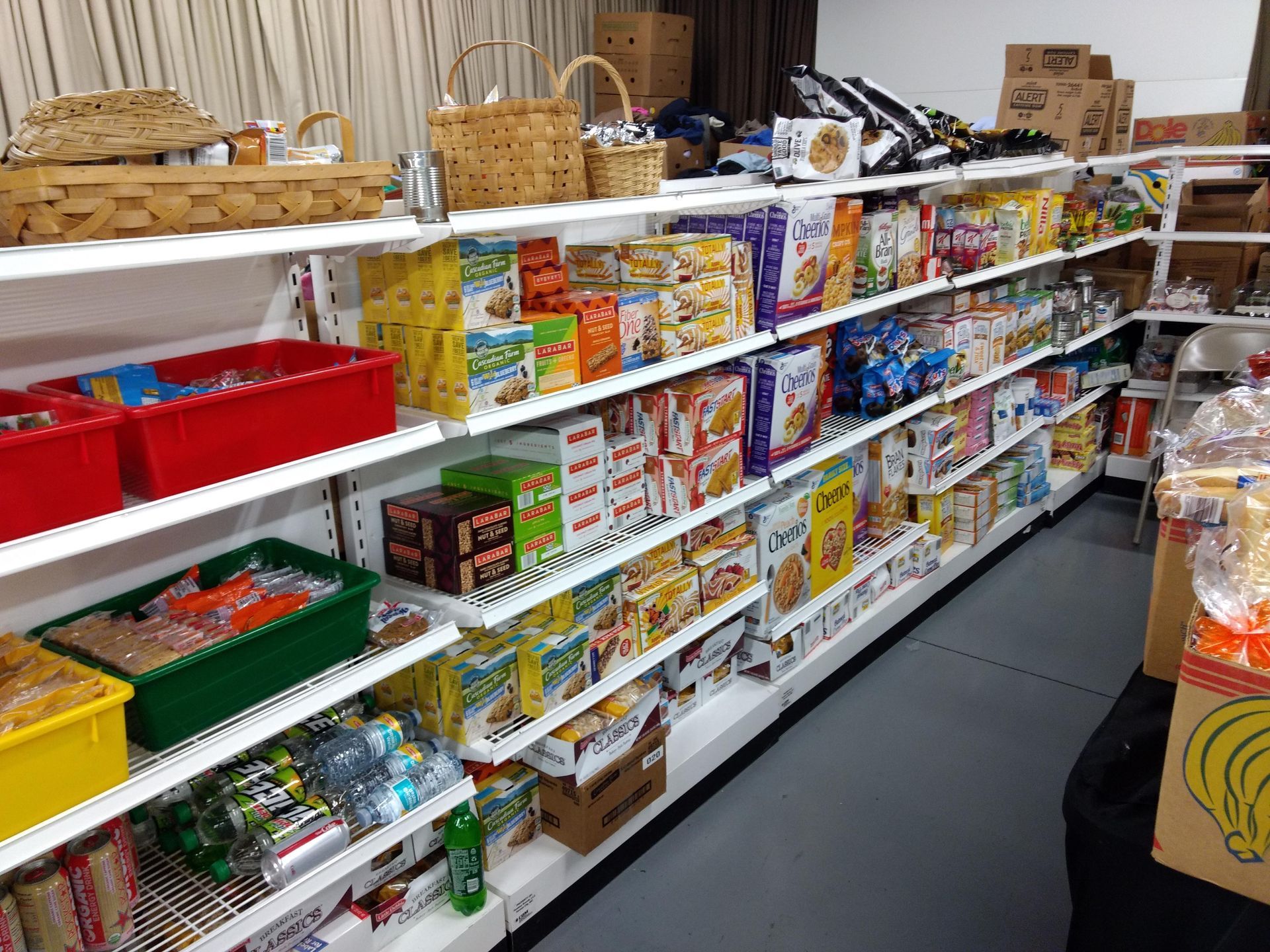 A grocery store aisle filled with lots of food items.