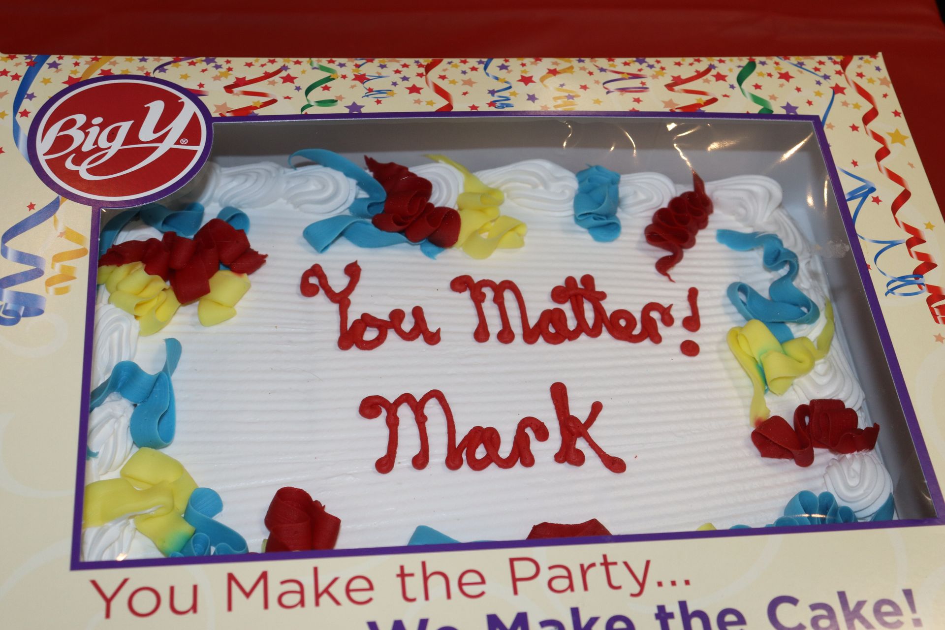 A cake that says you matter mark on it