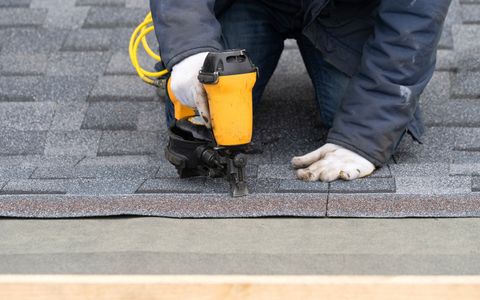 Man Replacing the Roof — Jacksonville, FL — Joe Turner Roofing