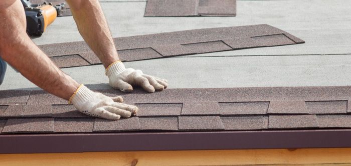 Man Fixing the Roof — Jacksonville, FL — Joe Turner Roofing