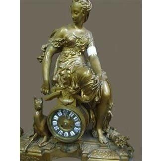 Statua orologio in bronzo