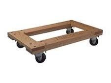 Wooden dolly with four black caster wheels.