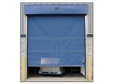 Blue industrial roll-up door, partially open, with a pallet inside the opening.