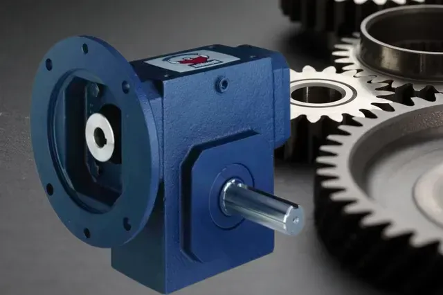 Blue right-angle gearbox with a flange, shaft, and background gears, possibly for industrial use.