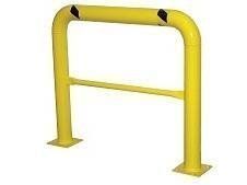 Yellow safety bollard with a horizontal bar, painted black diagonal stripes on top.