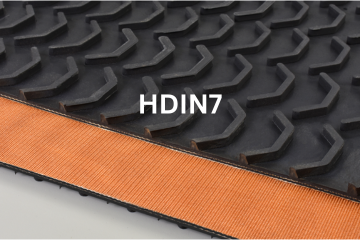 Blue roughtop industrial conveyor belt, blue with textured surface, stacked over a red belt.