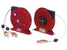 Two red retractable welding ground cable reels with attached clamps.