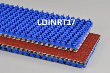 Blue roughtop industrial conveyor belt, blue with textured surface, stacked over a red belt.