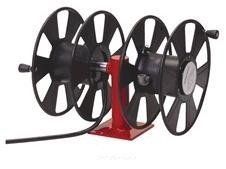 Black and red triple cord reel with a black cord extending out, mounted on a red base.