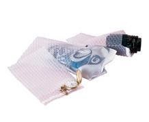 Bubble wrap packaging protecting various items: watch, shoes, and electronic components.